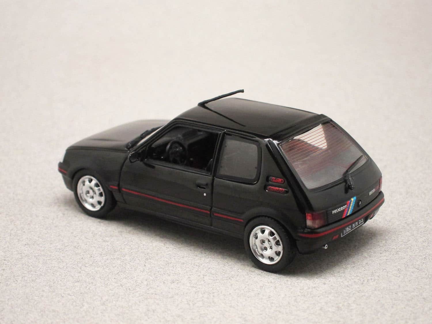 Peugeot 205 GTI 1 9 1992 noire déco PTS Norev 1 43e Minicarweb