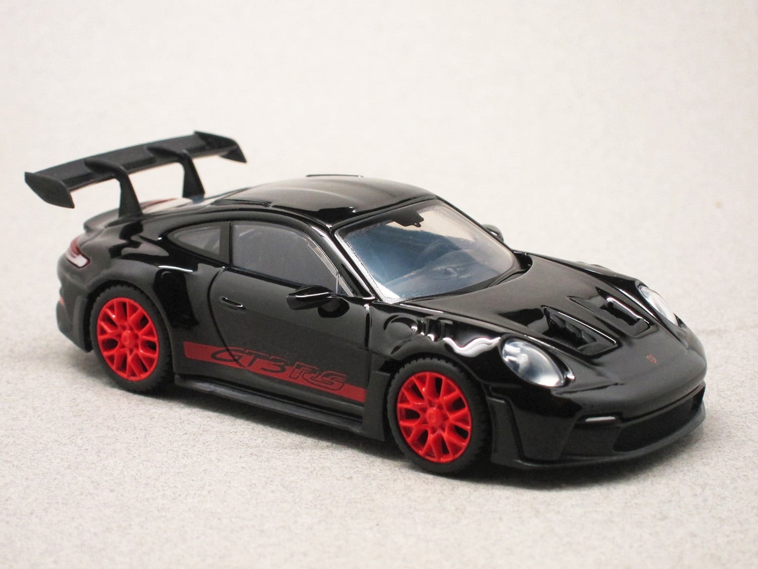 Porsche 911 (992) GT3 RS noire (Bburago) 1/43e